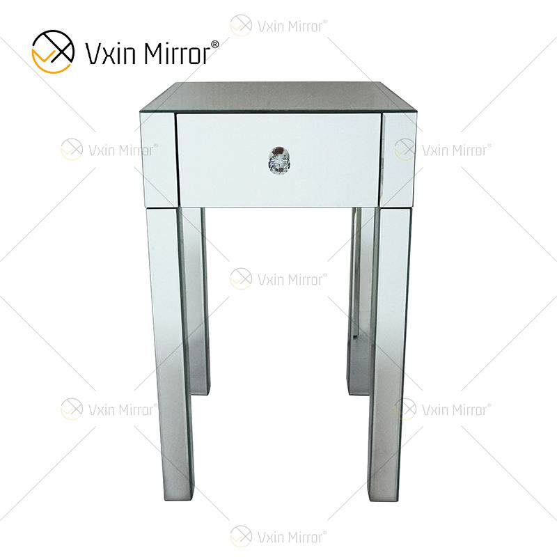 mirror behind bedside table