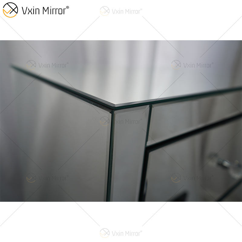 black mirrored bedside table