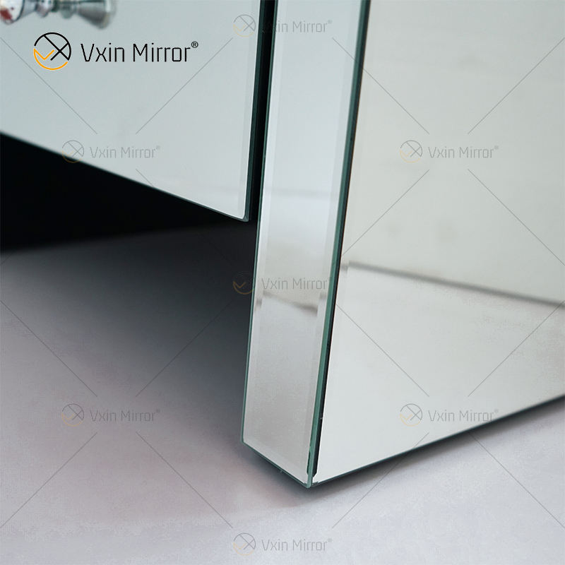 mirrored dresser and nightstand