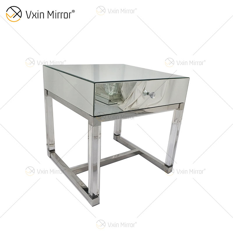 mirrored nightstand with gold trim