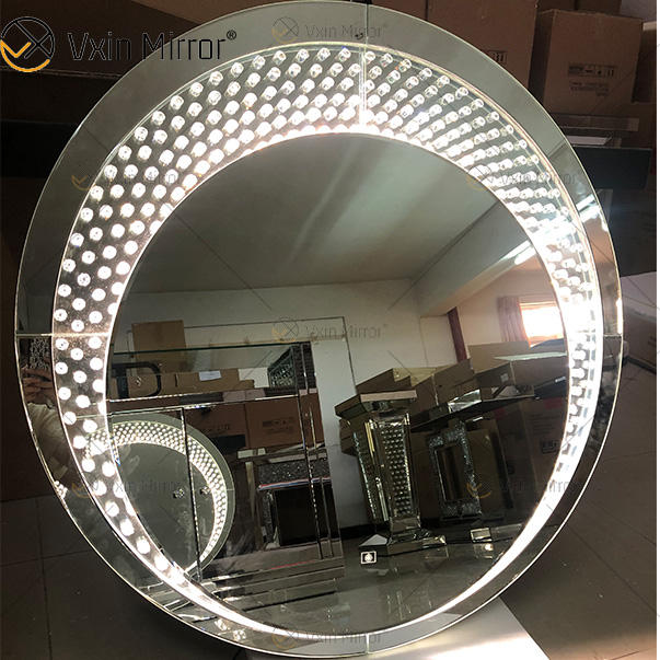 mirrors with lights around them